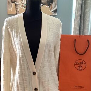 Hermes cream cardigan 100 percent wool retails $1600.00